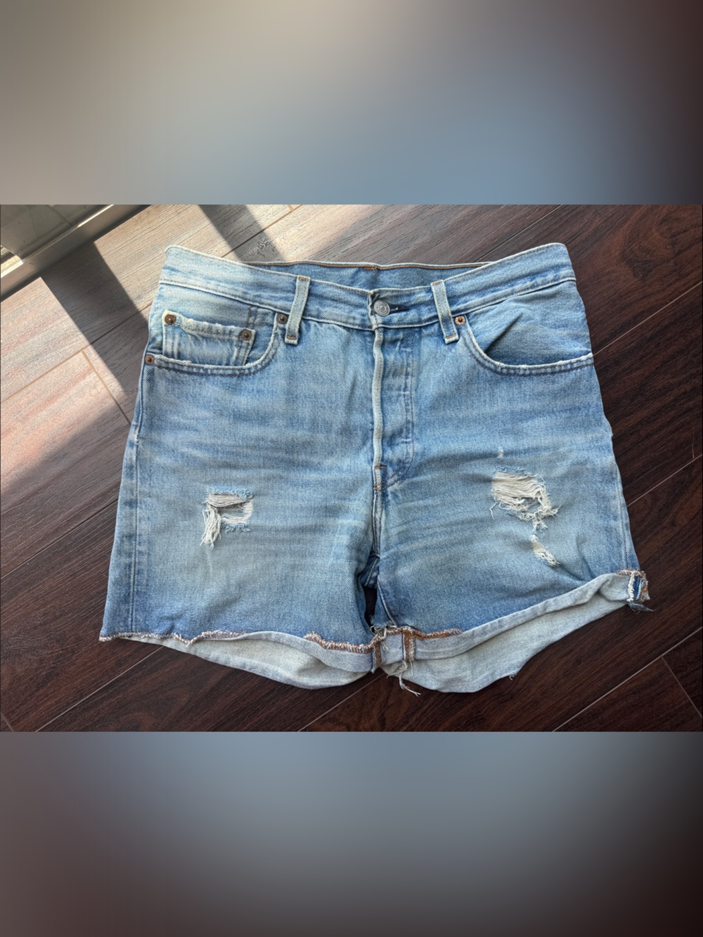 Light Wash Distressed Denim Shorts